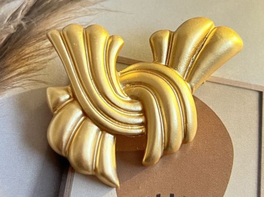 Gold Tone Swirl Bow Brooch